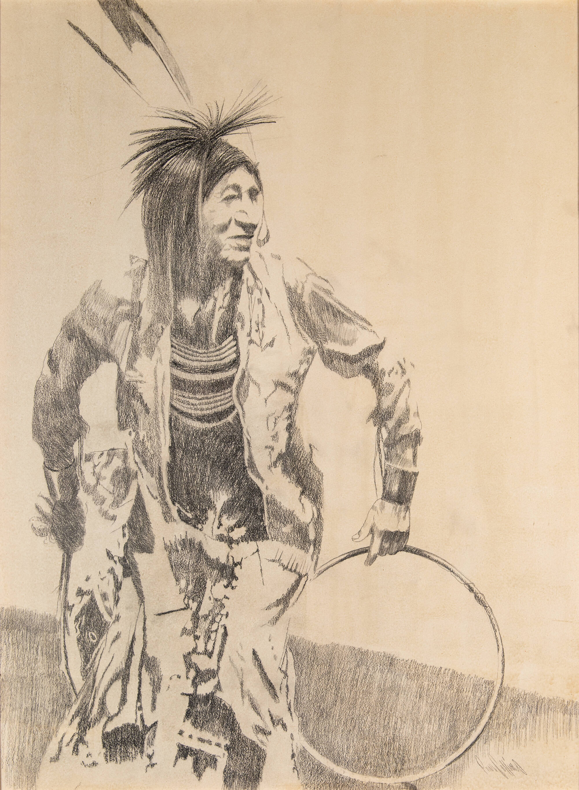 Graphite drawing of a indigenous person holding a hoop.